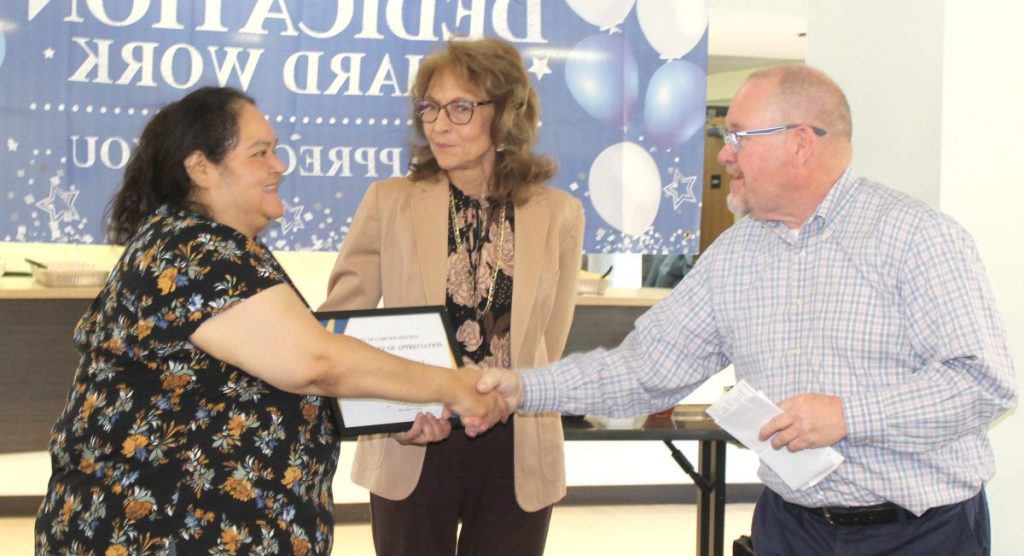 From left, Veronica Gabriel, Karen Kaufhold and Mayor Mark Kupsky